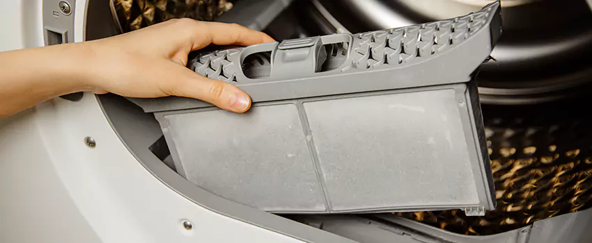 Signs Of A Clogged Dryer Lint Trap in Champaign, Illinois
